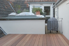 Universal adjustable height decking support pad finished deck