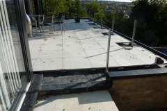 Universal paving pedestal on terrace with procelain tiles
