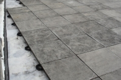 Concrete paving mounted onto paving supports