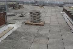 Paving slabs sitting on pave pads