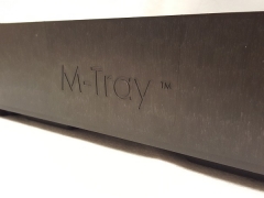 close up of M-Tray logo