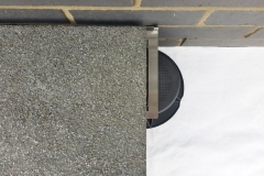Metal-plate-for-paving-to-wall-with-one-slab-installed