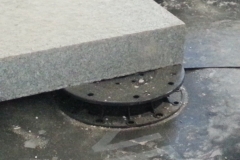 Adjustable Minipad for paving with granite slab close up