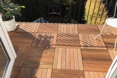 Ipe-decking-tiles-up-to-metal-ballustrade
