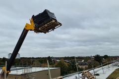 Extendable-Forklift-lifting-Wildflower-M-Tray-onto-Roof-of-Turing-House-Pic-1-1