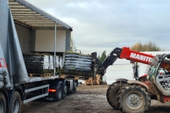 Wildflower-M-Trays-being-lifted-off-of-truck-by-Forklift-Pic-2