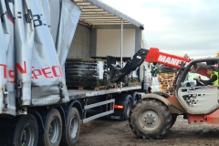 Wildflower-M-Trays-being-lifted-off-of-truck-by-Forklift-Pic-1-1
