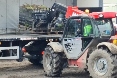 Wildflower-M-Trays-being-lifted-off-truck-by-Forklift-Pic-4