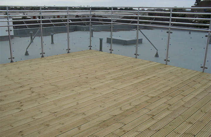 Decking being installed at terrace at oakwood group