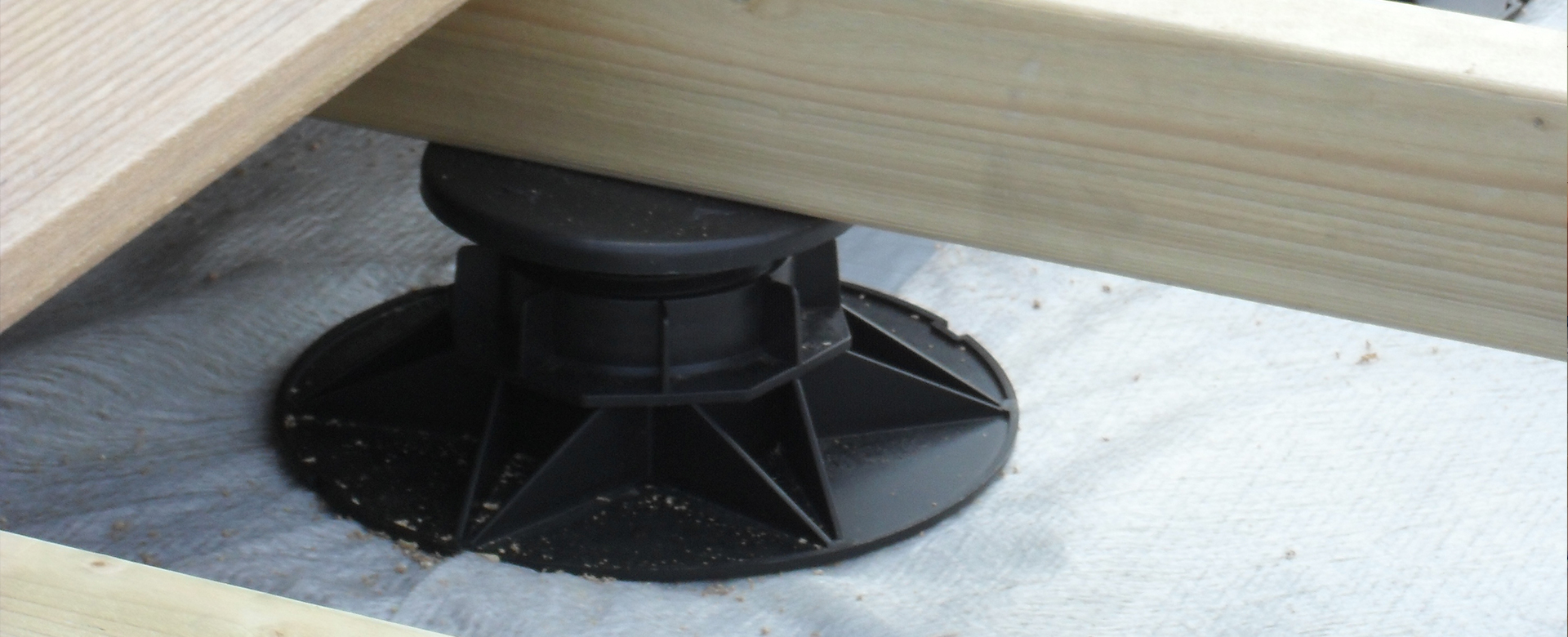 A close up image of a decking pedestal Wallbarn