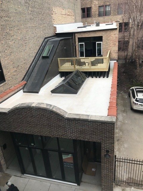 An image of a decking installation using Wallbarn's MegaPad pedestals in Chicago