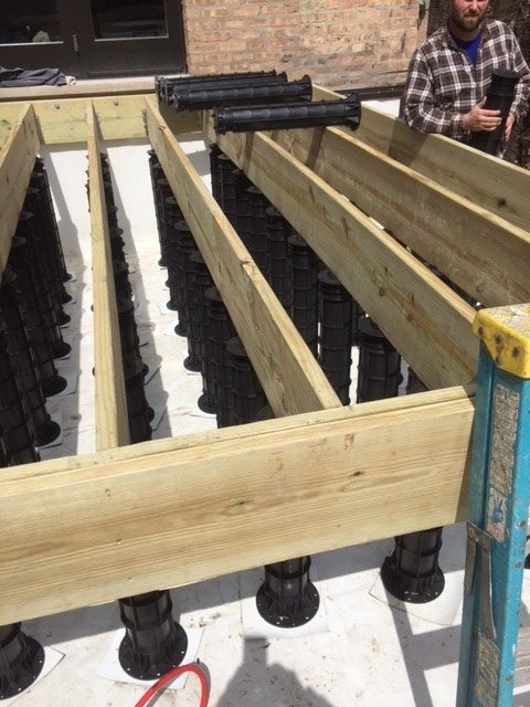 An image of a decking installation using Wallbarn's MegaPad pedestals in Chicago