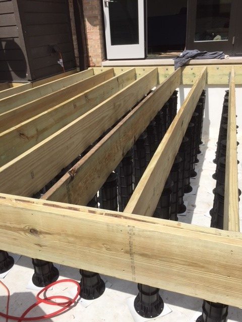 An image of a decking installation using Wallbarn's MegaPad pedestals in Chicago