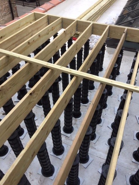 An image of a decking installation using Wallbarn's MegaPad pedestals in Chicago