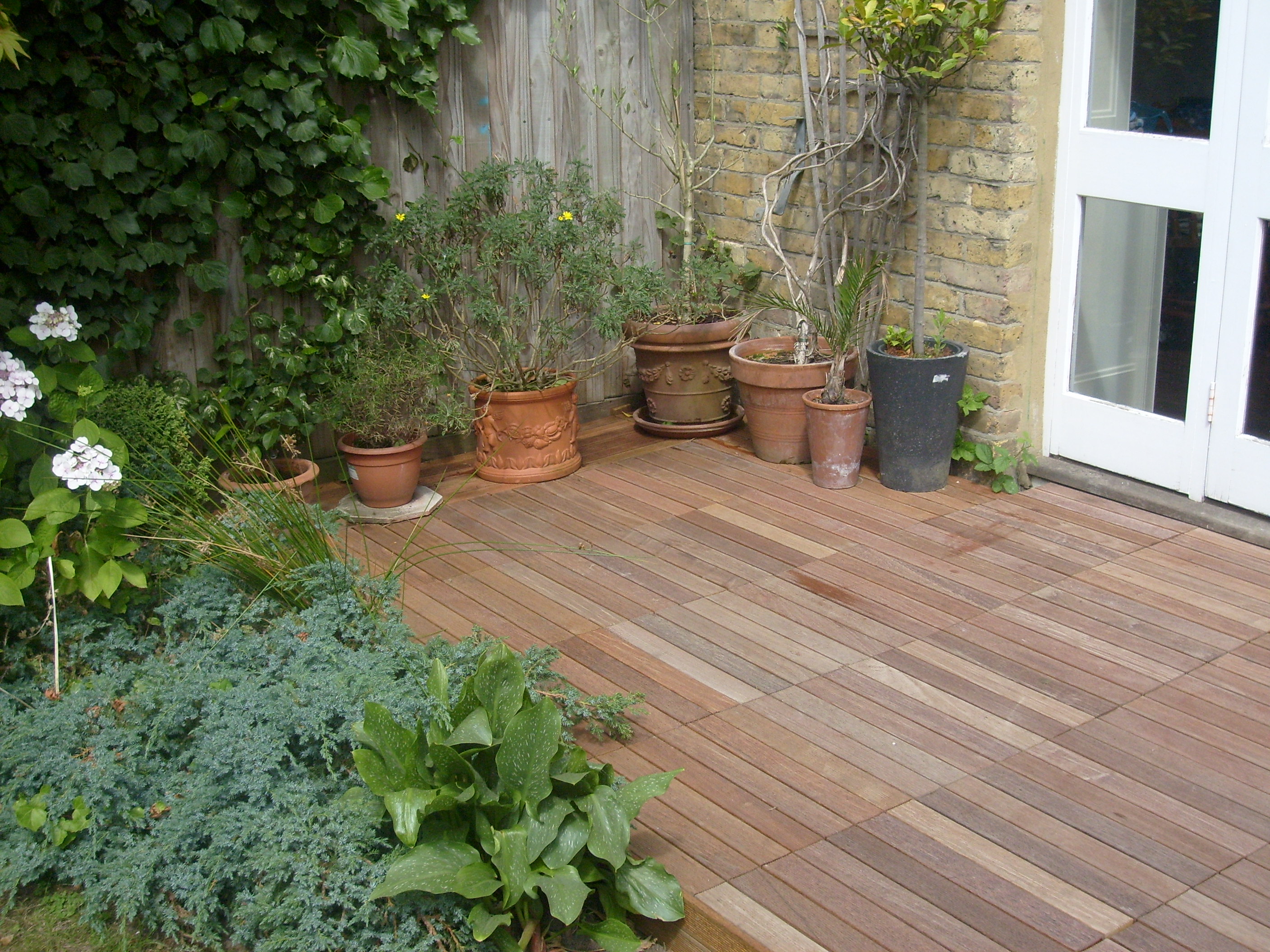 decking in a line on patio Wallbarn