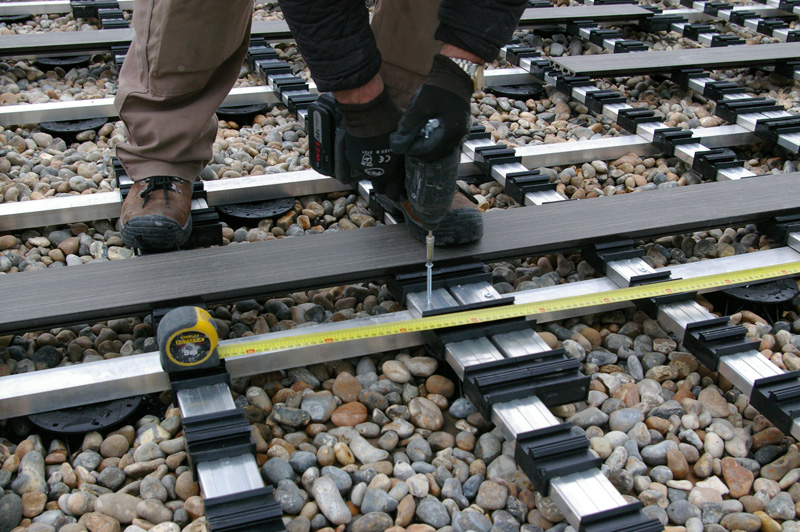 A closeup image of an iDecking installation taking place in London