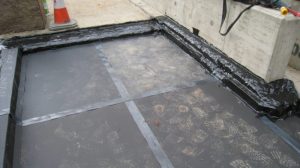 Bituminous Protection for hot melt taped edges