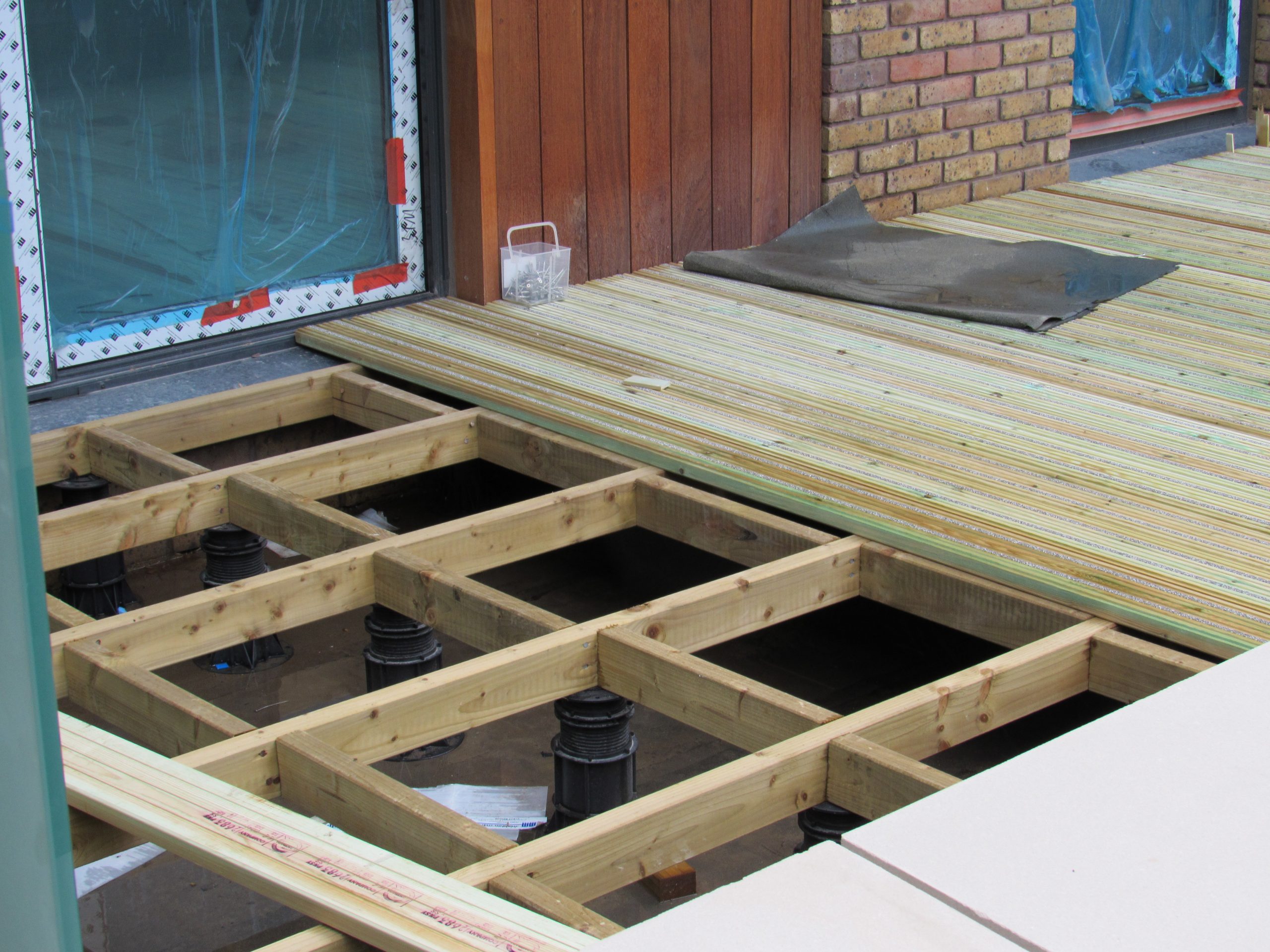 TD Megapad with decking Surrey Quays - frame and deck boards part installed