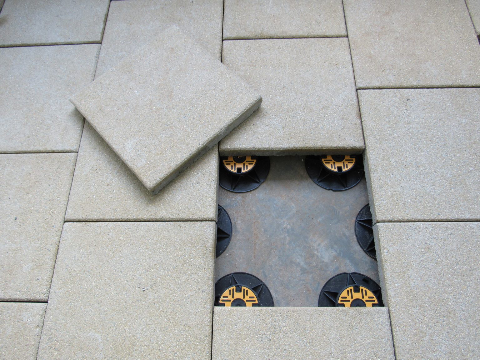 Universal pedestals for paving and decking supporting paving slabs