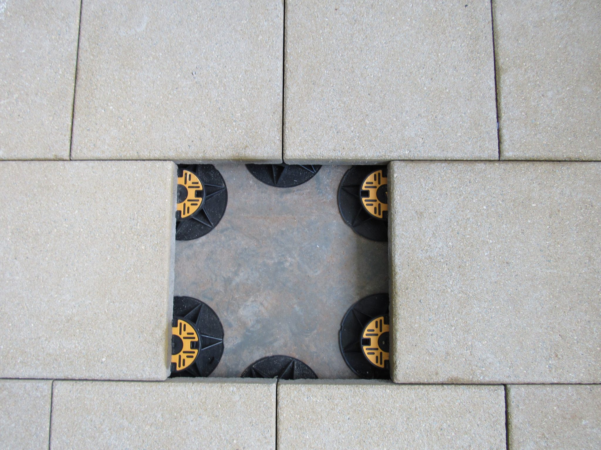 Universal pedestals for paving and decking supporting paving slabs