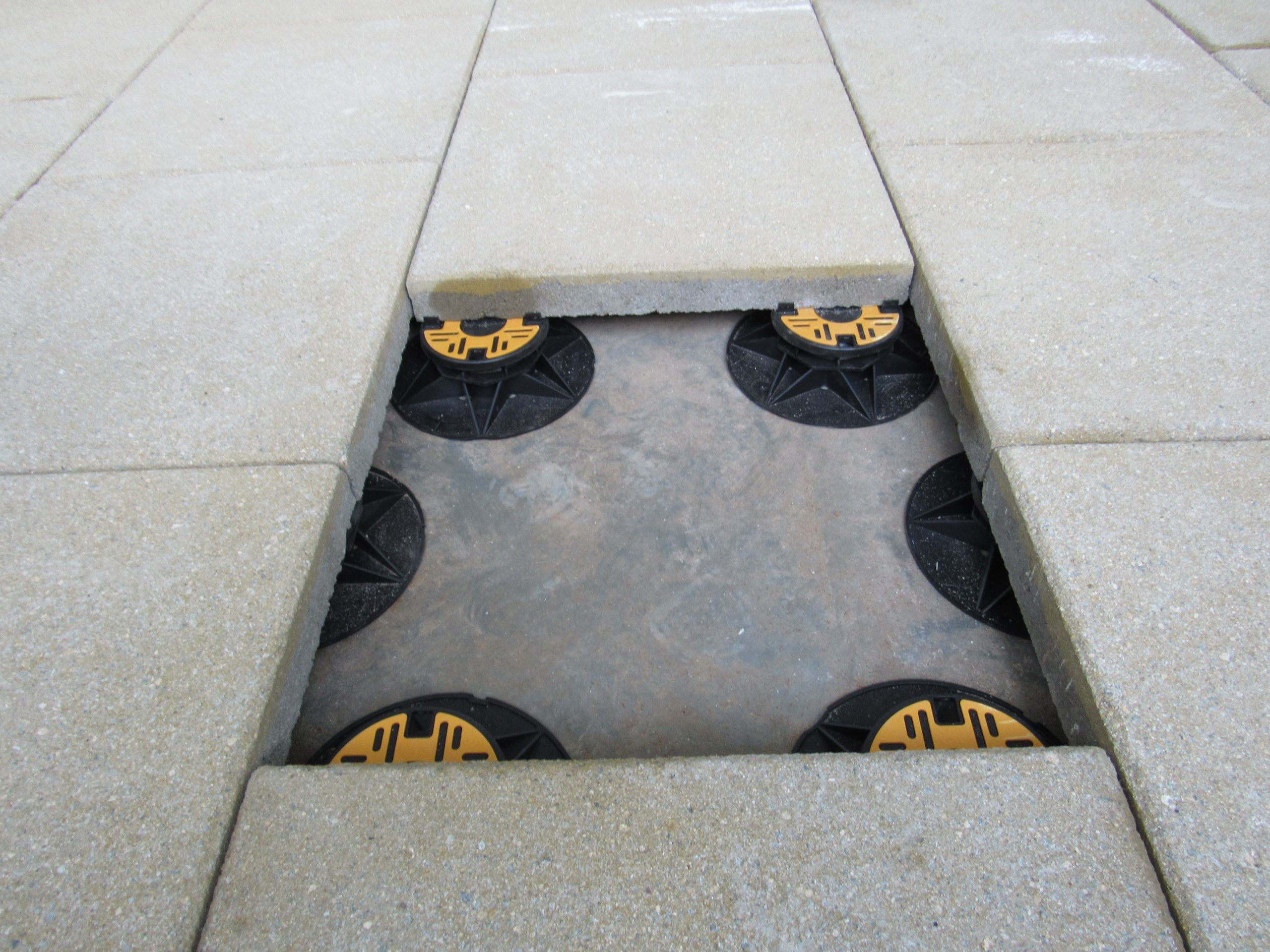 Universal pedestals for paving and decking supporting paving slabs