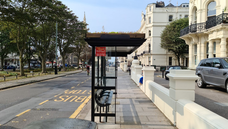 Side-Profile-of-Clear-Channel-Bus-Shelter-with-Sedum-M-Tray---Brighton