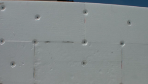 Fixing dowels fixed through insulation boards