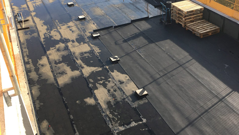 Protection-of-waterproofing-membrane-roof-Ealing-Studios-scaled